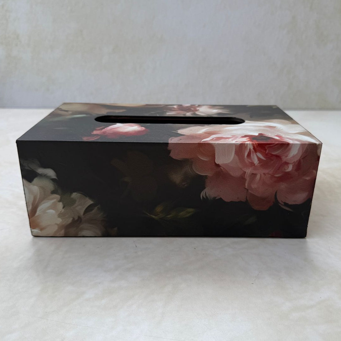 Floral-patterned tissue box on a white surface