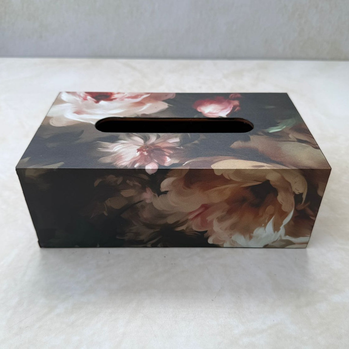 Floral-patterned tissue box cover on a white surface