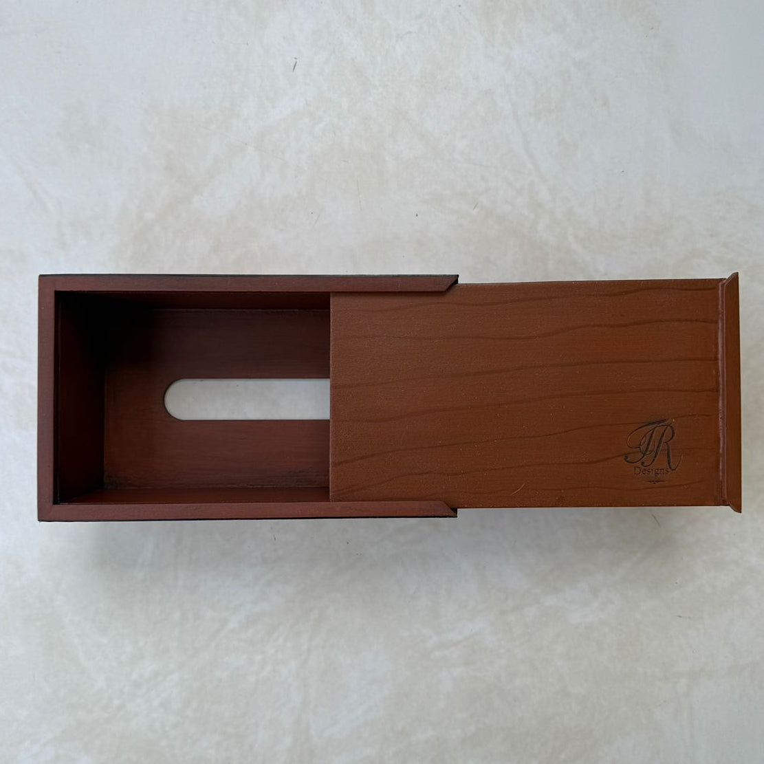 Bottom view of wooden tissue box on a beige textured background