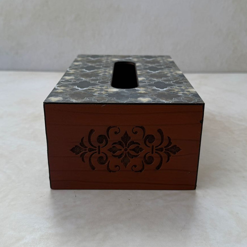 Tissue box cover with marble top and wooden base on a white surface