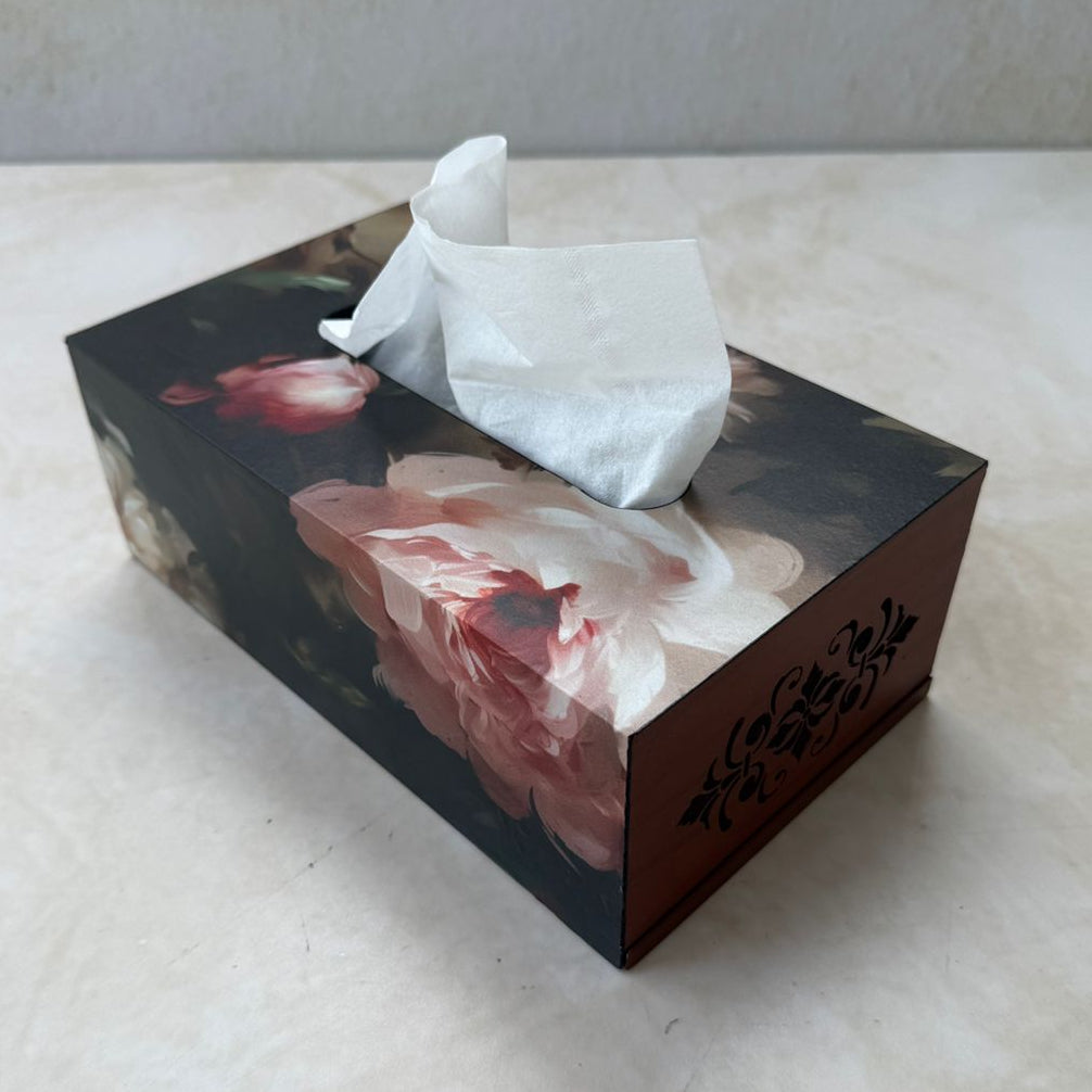 Tissue box with floral design on a white surface