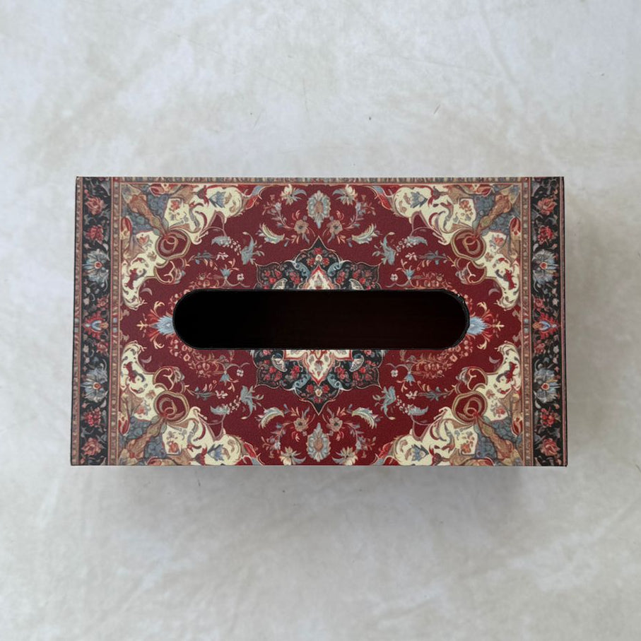 Decorative tissue box with a pattern on a white surface