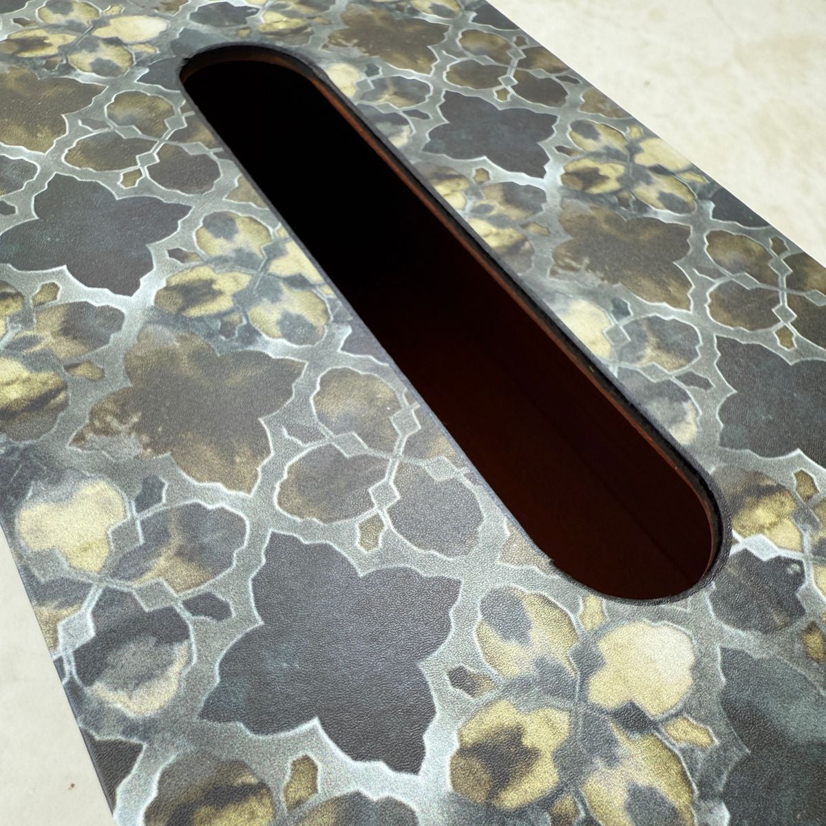 Close-up of a decorative tissue box with patterns