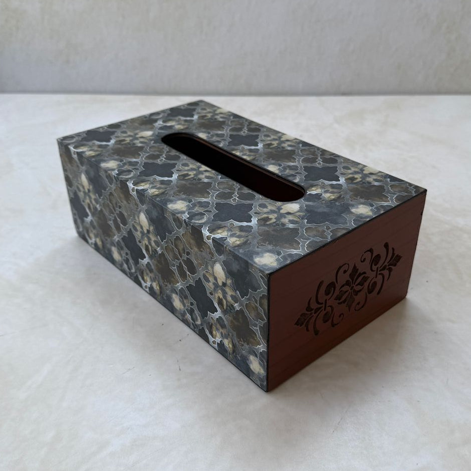 Tissue box cover with marble pattern on a white surface